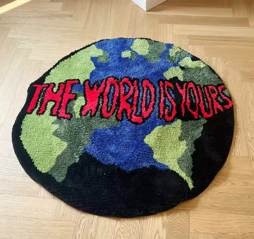 Tufted “THE WORLD IS YOURS” Rug