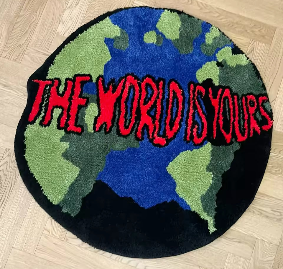 Tufted “THE WORLD IS YOURS” Rug