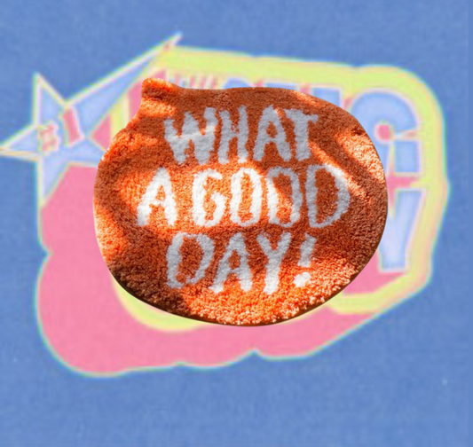 Orange Tufted "What A Good Day" Quote Rug