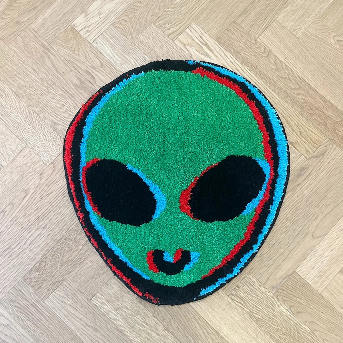 Green and Black Tufted "Alien Head" rug - TheRugGuy