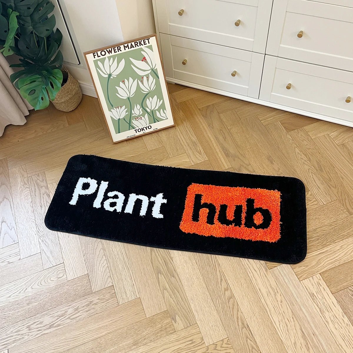 Orange and Black Tufted Plant Hub Rug - TheRugGuy