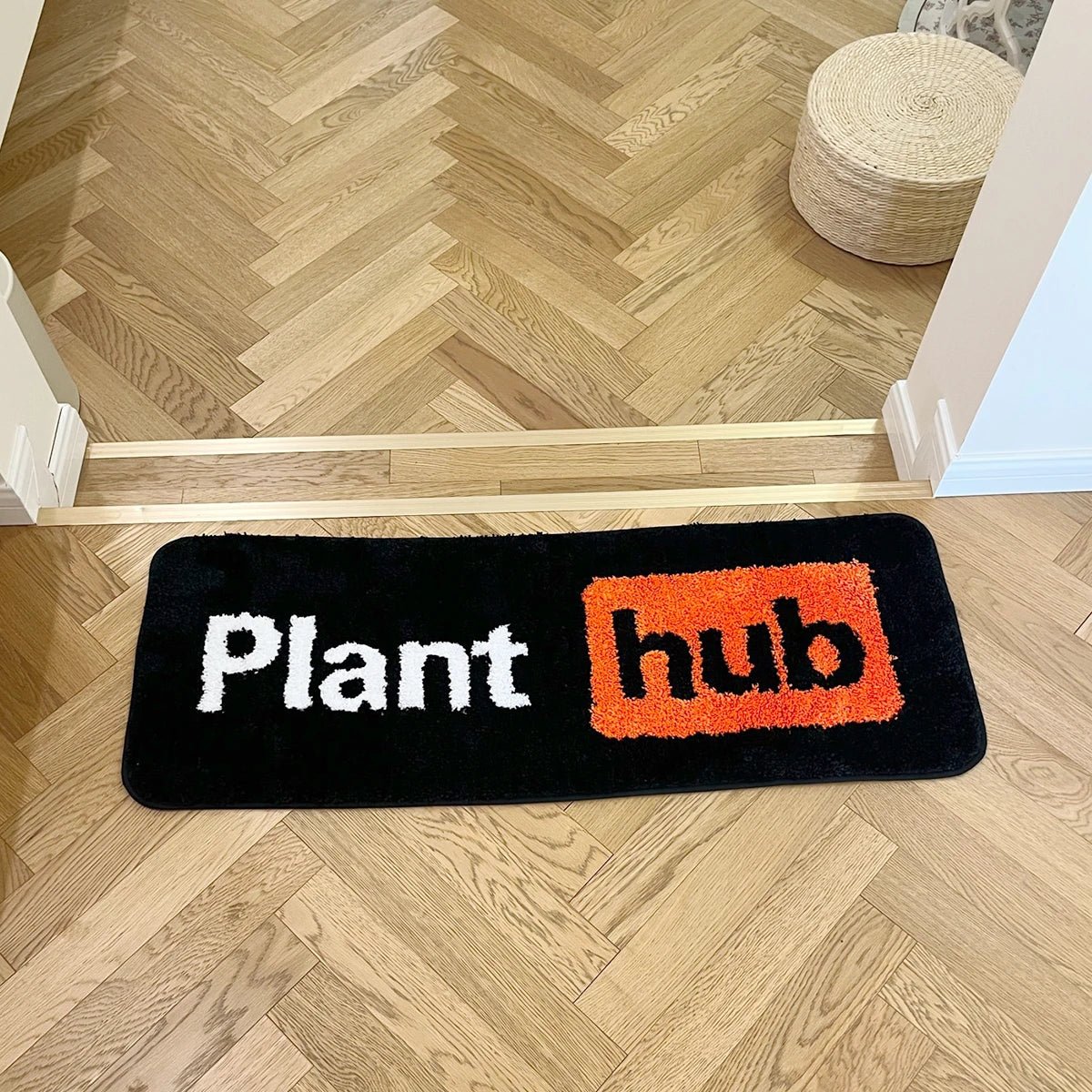 Orange and Black Tufted Plant Hub Rug - TheRugGuy