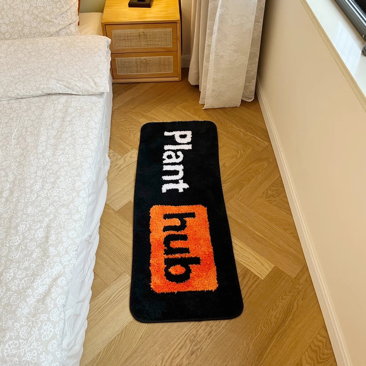 Orange and Black Tufted Plant Hub Rug - TheRugGuy