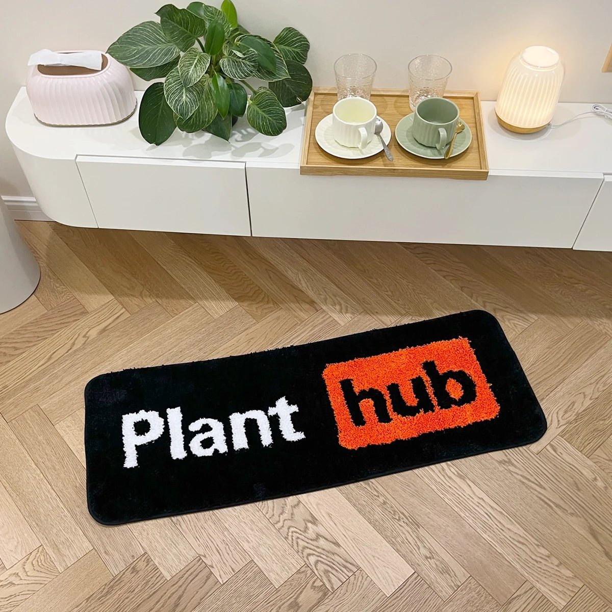 Orange and Black Tufted Plant Hub Rug - TheRugGuy