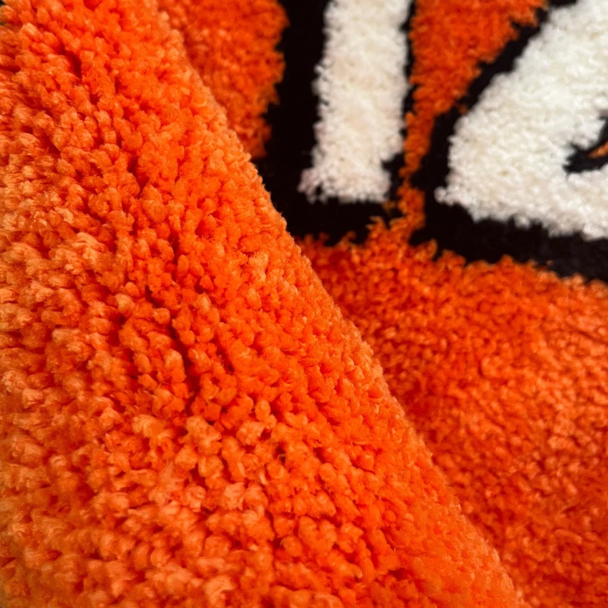 Orange and White Tufted Football Rug - TheRugGuy