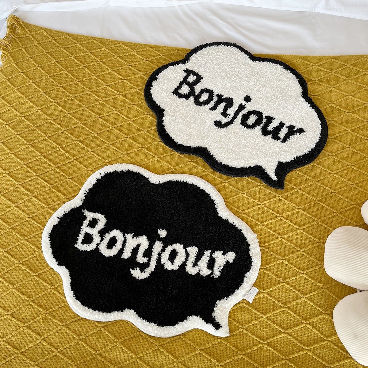 White and Black Tufted "Bonjour" Quote rug - TheRugGuy